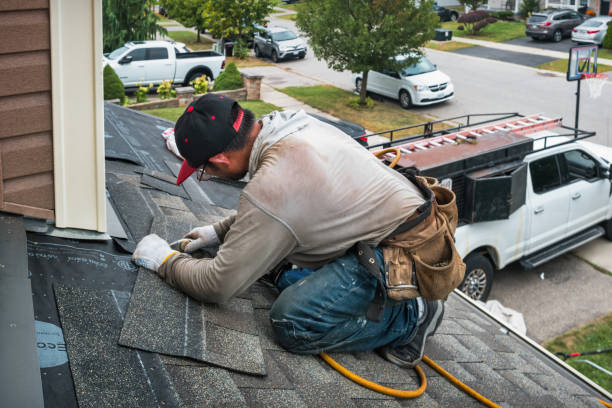 Professional Storm Damage Roof Repair technician working in Lynnfield, MA